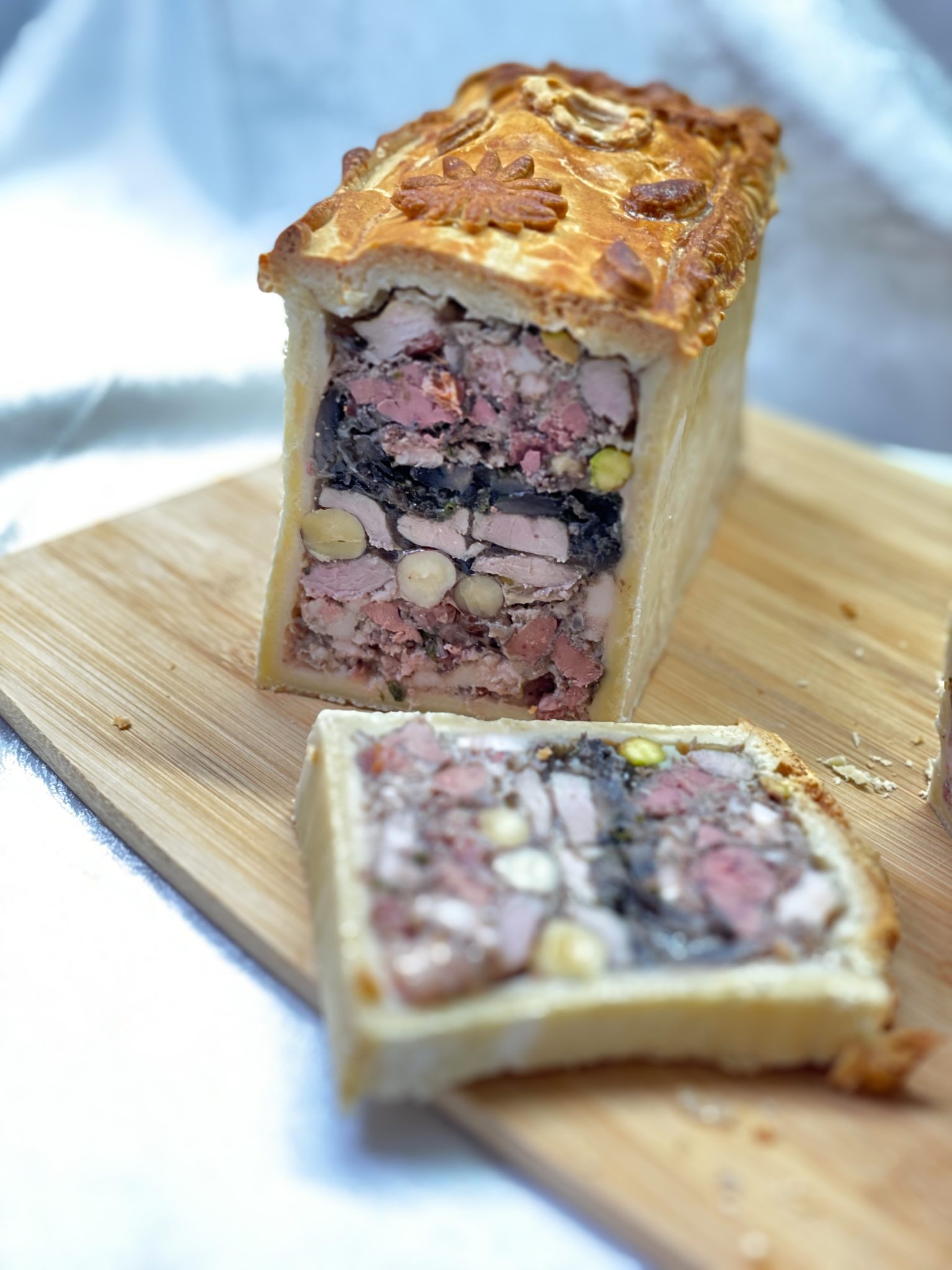 Un pâté en croûte aux aiguillettes de canard Les 2 quiches